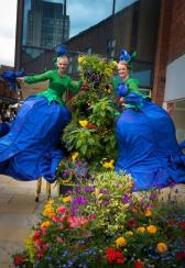 Blue Belles - Flower Stilt Walkers - Walkabout Entertainers