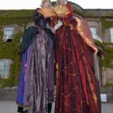 Rum BaBa's Madame Ovary - Renaissance Ladies on Stilts - Stilt Walkers