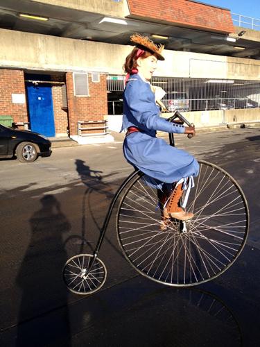 Curious Sitwells - Astride a full sized penny farthing bikes - Walkabout 