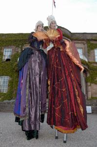 Rum BaBa's Madame Ovary - Renaissance Ladies on Stilts - Stilt Walkers